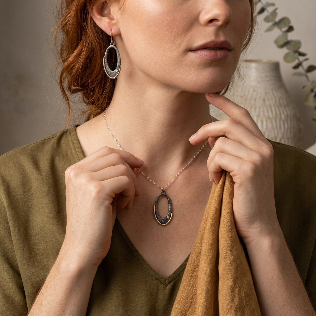 Gilded Arc Oval Earrings