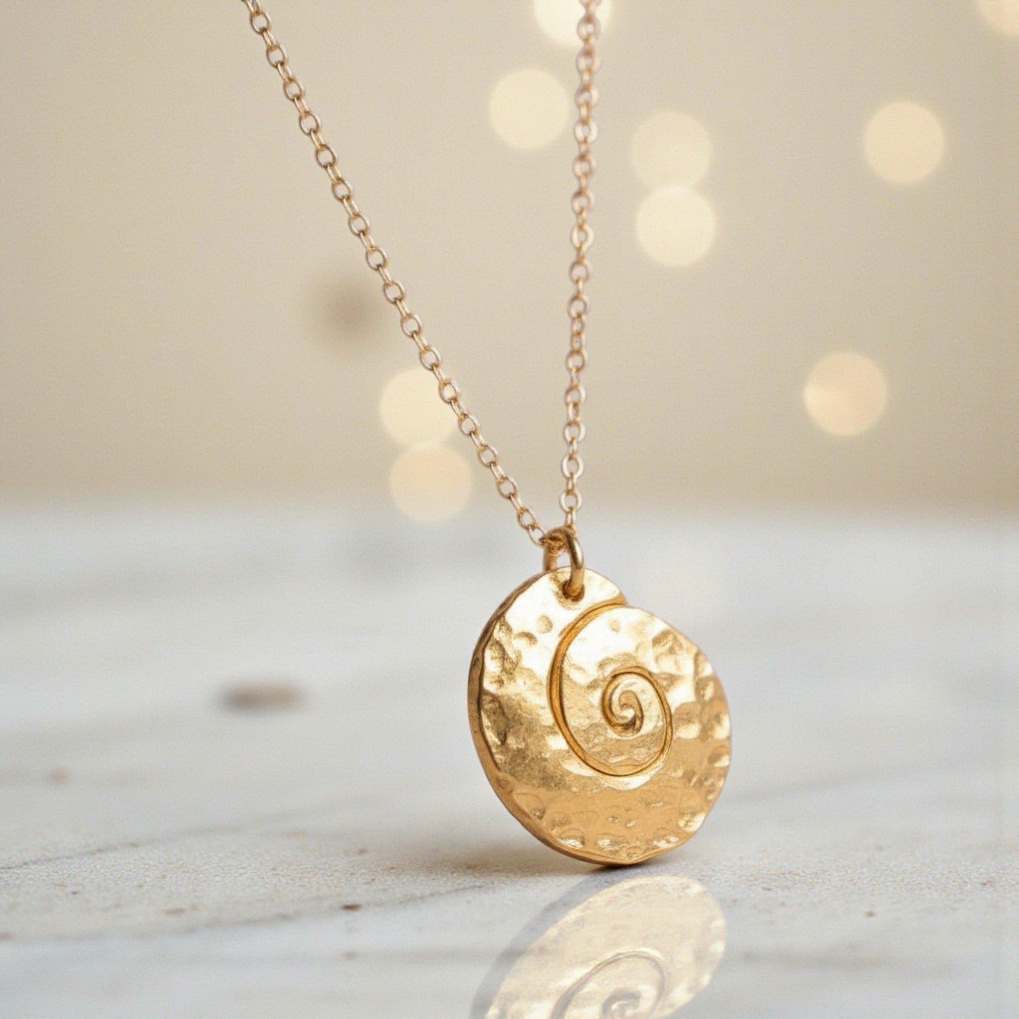 Gilded Nautilus Medallion - Necklaces